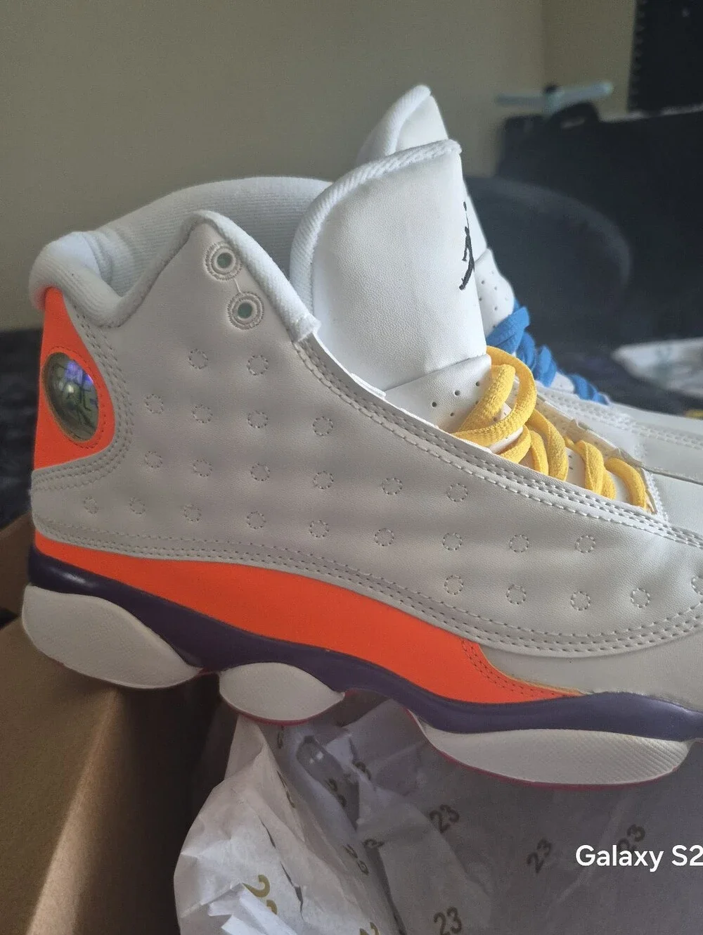 Jordan Men's White Sneakers with Orange, Yellow & Blue Accents